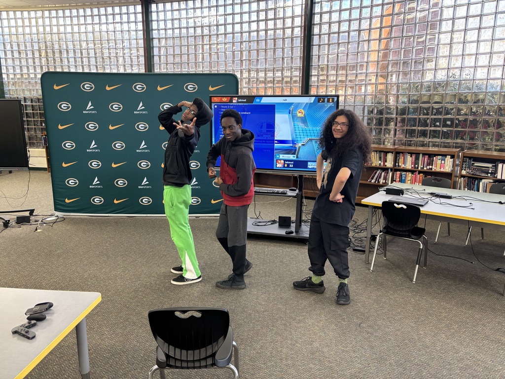 eSports team members pose after their victory