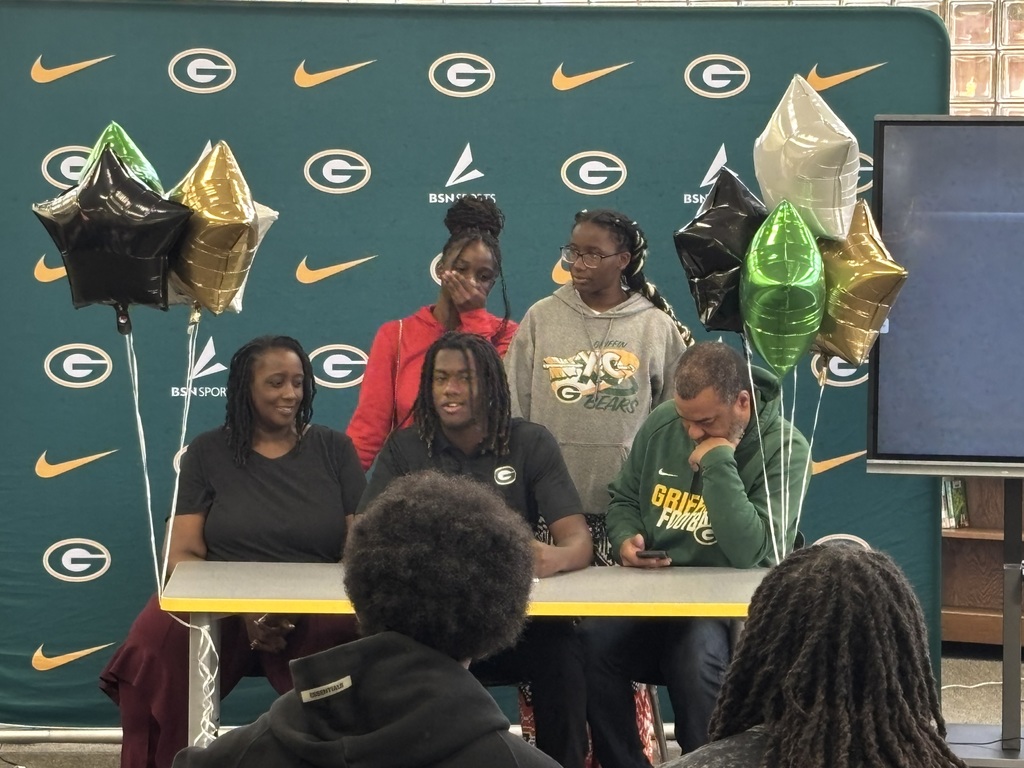Rashad King surrounded by his family addresses his teammates