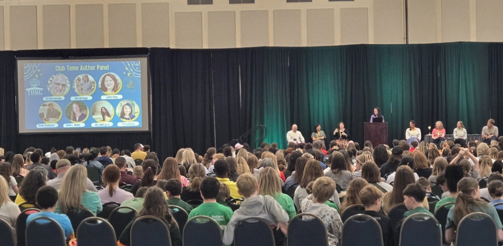 Author Panel with several authors on stage