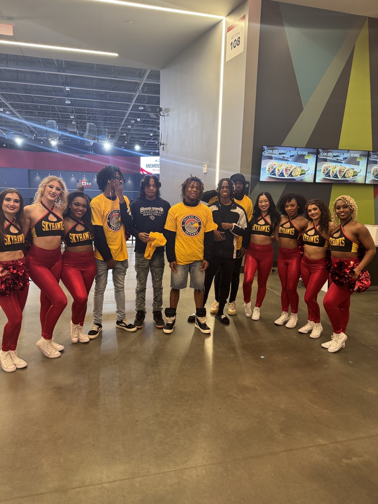 student athletes with cheerleaders