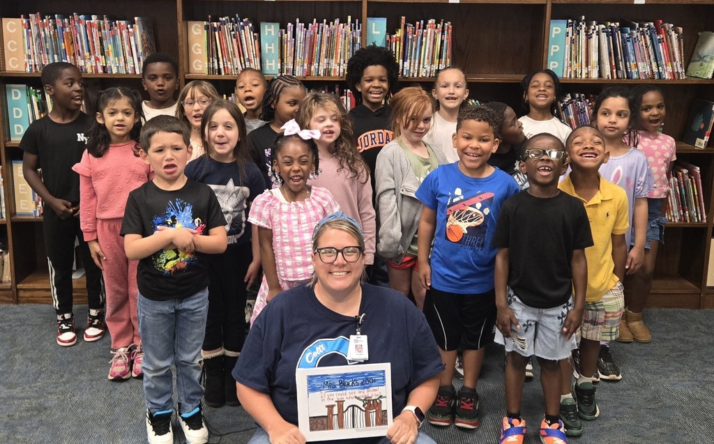 class pic holding book