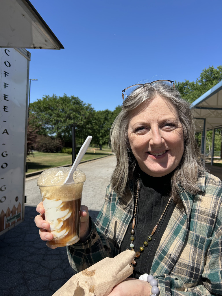 one woman holding ice cream float