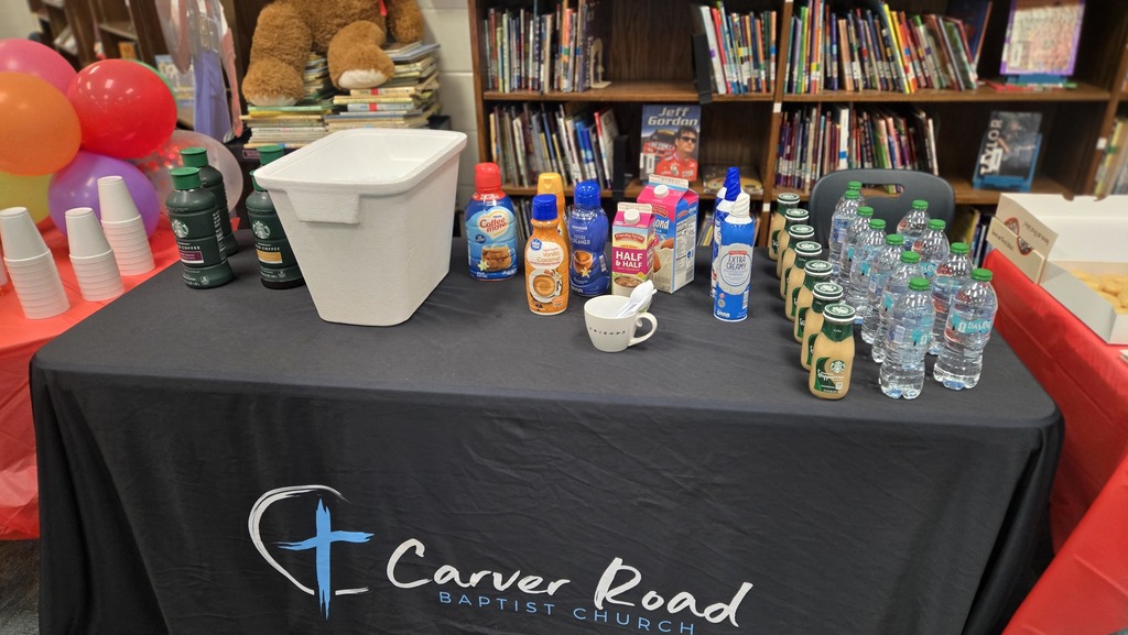table with drinks and Carver Road Baptist table cloth