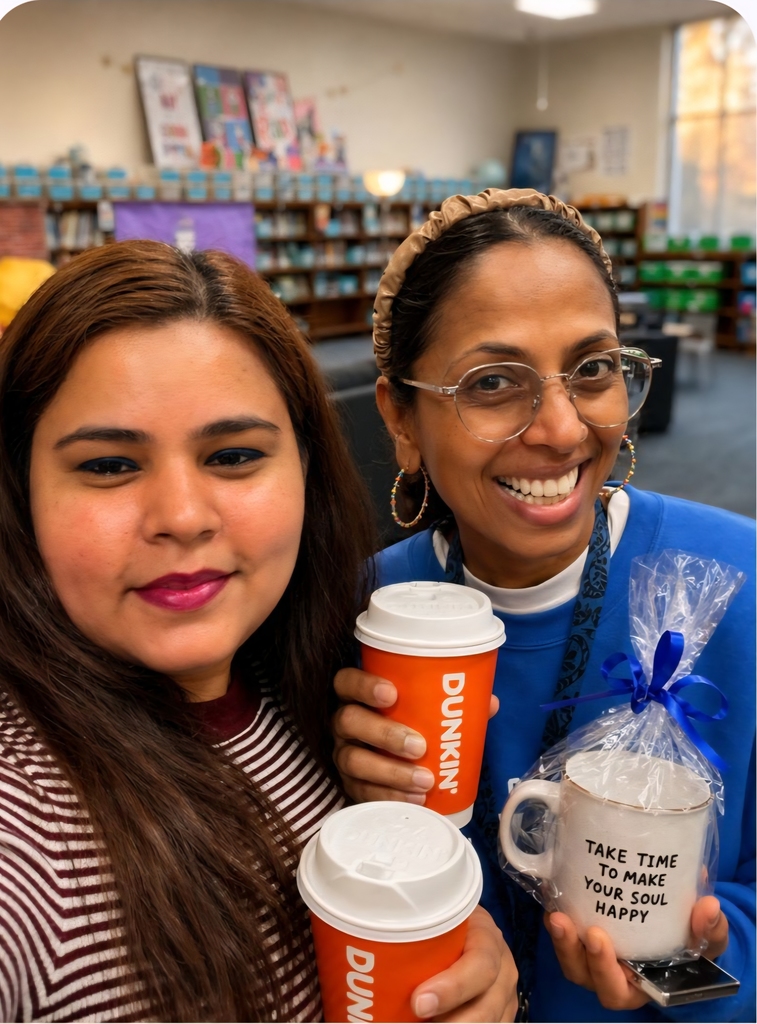 2 teachers with coffee cups