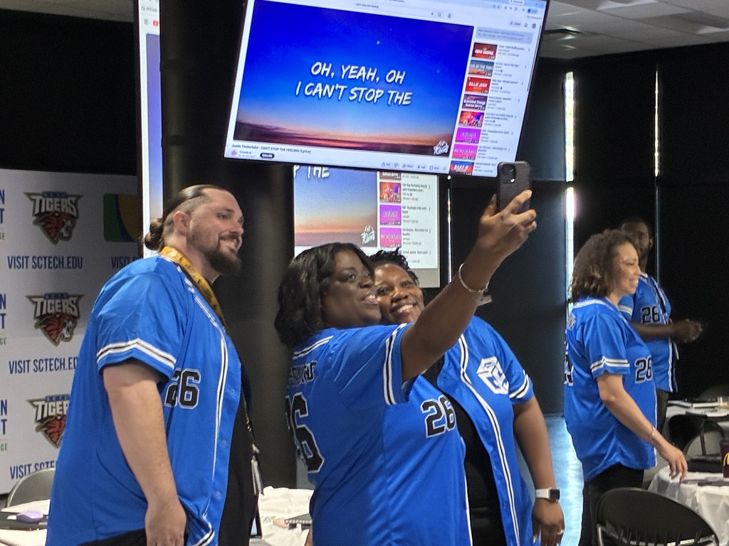 staff taking selfies