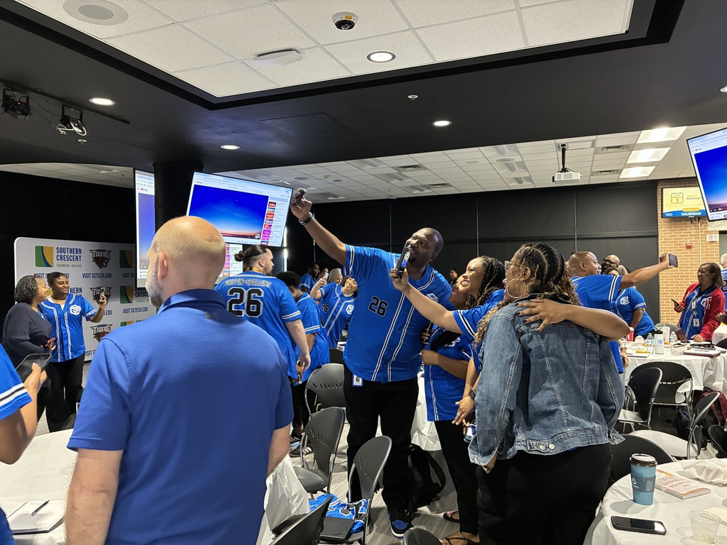 staff taking selfies