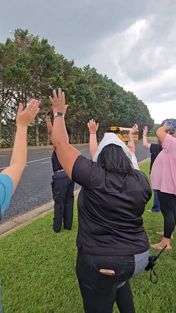 adults waving