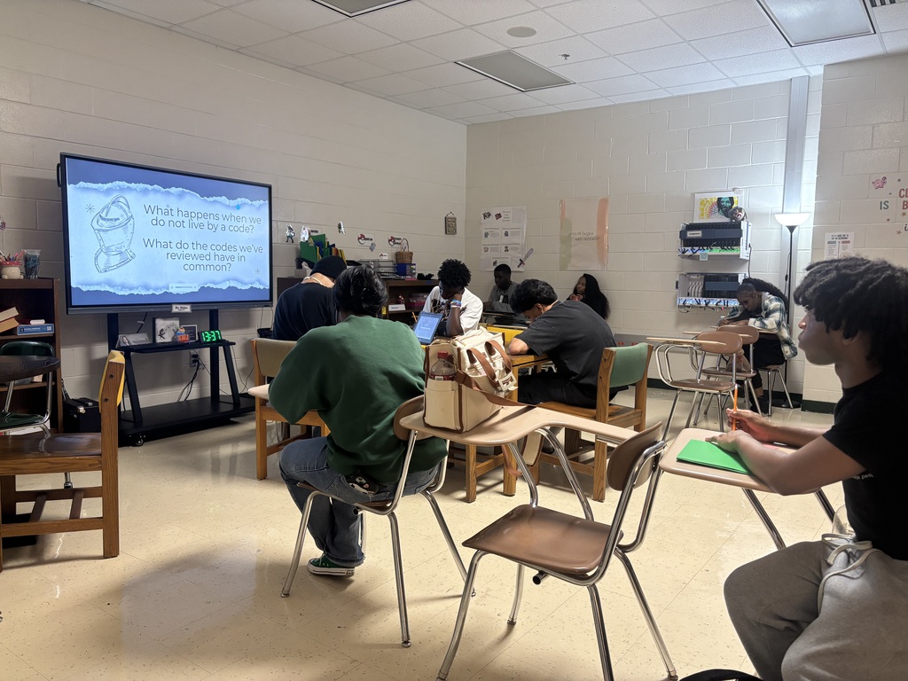 Students hear a presentation about honor codes