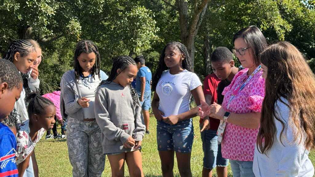 students looking at flowers