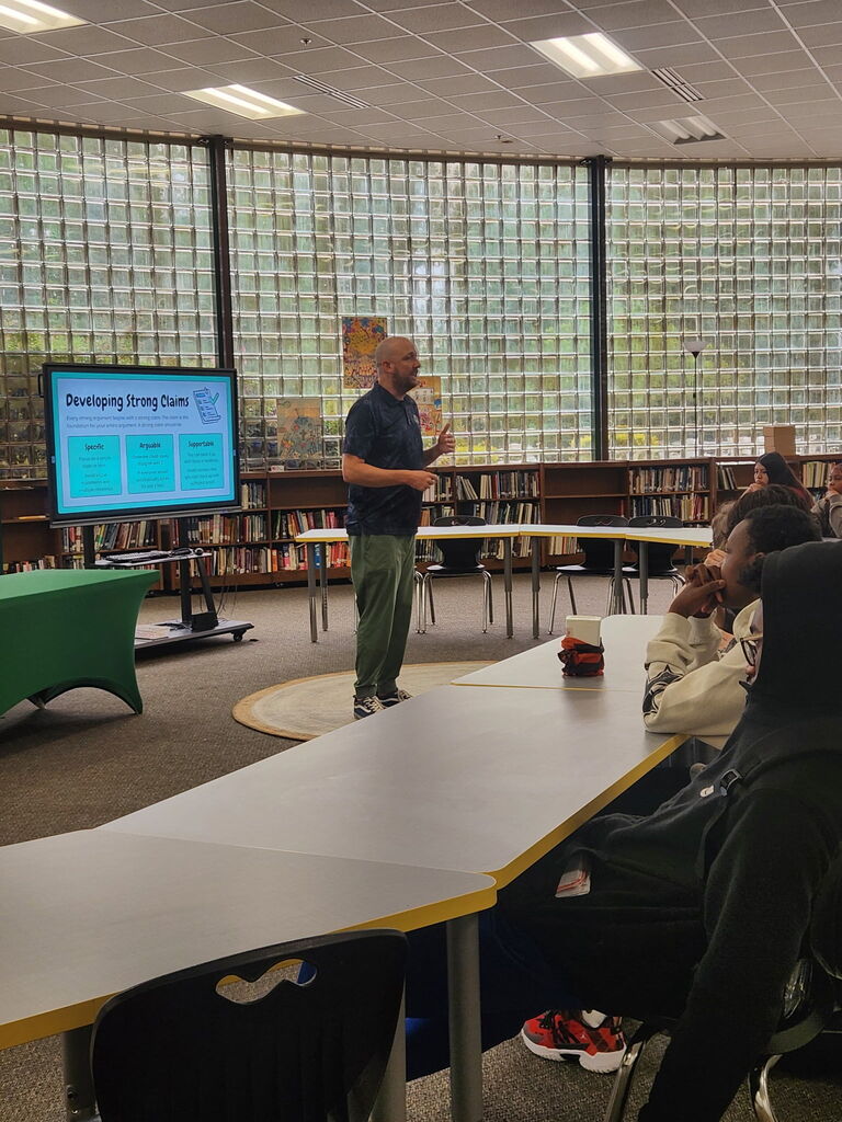 Mr. McClelland teaching the students about how to develop a strong claim