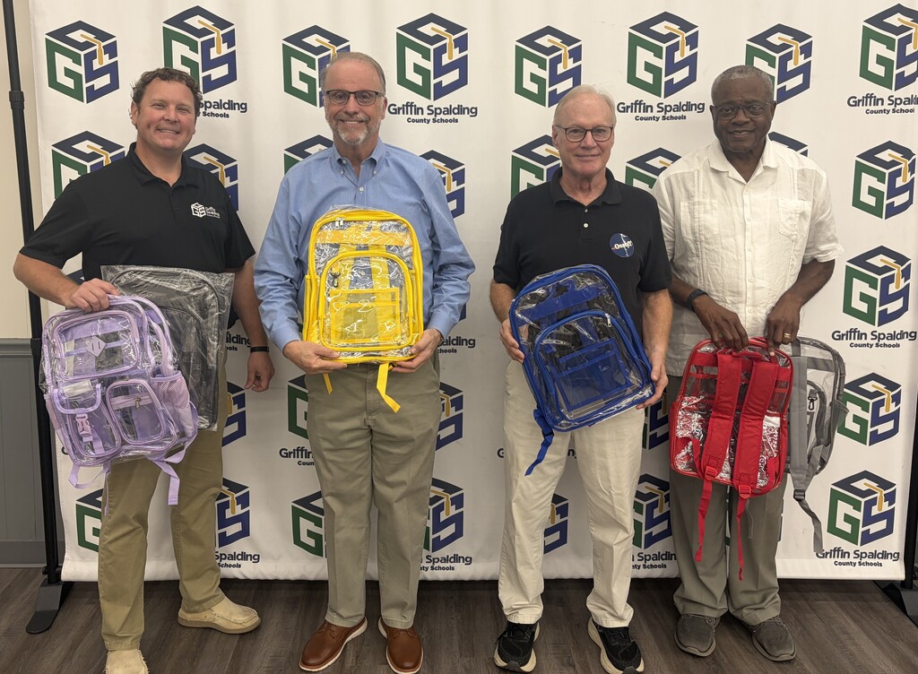 men with bookbags