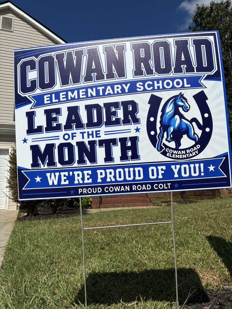 Leader of the Month sign in front of house