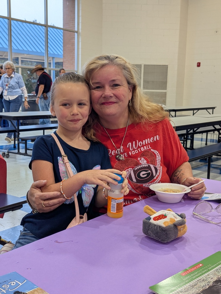 family in cafeteria at table