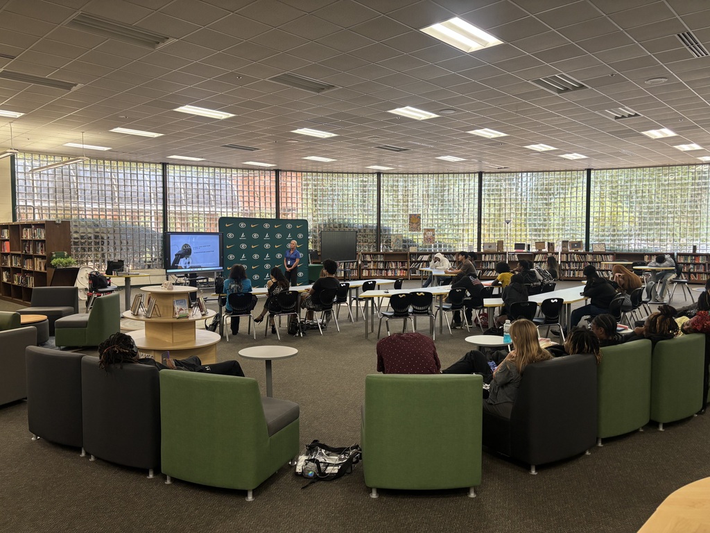 Students enjoy a presentation about Universal Technical Institute