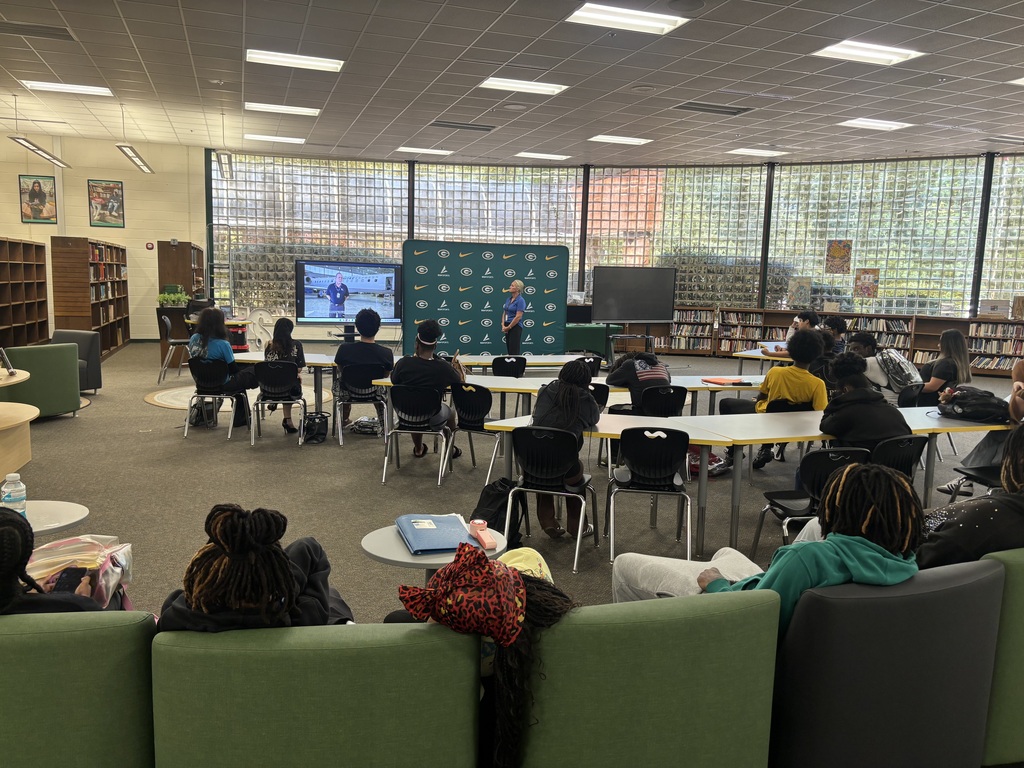 Students watch a video from UTI