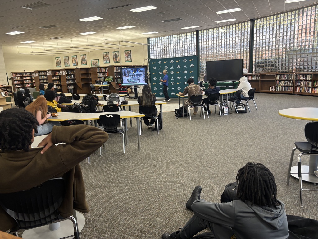 Students enjoy a presentation about Universal Technical Institute