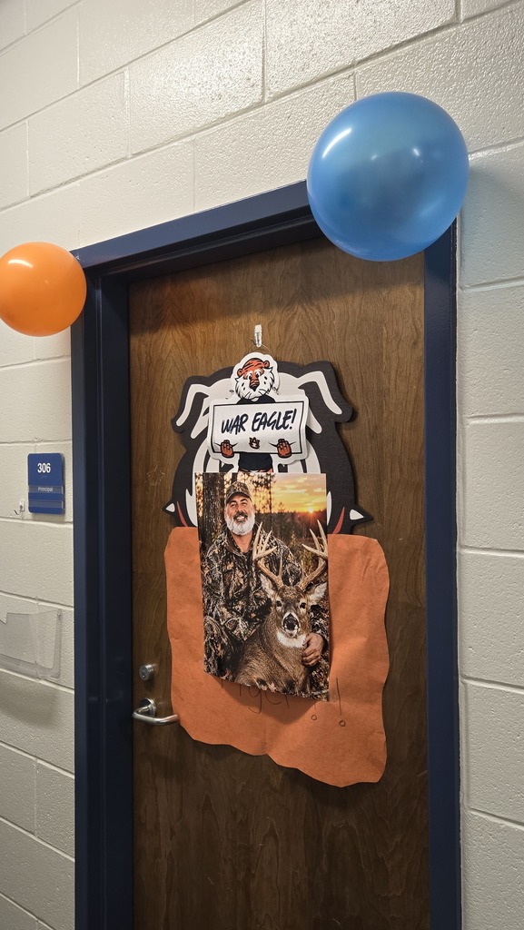 door decorated with Auburn colors and sign