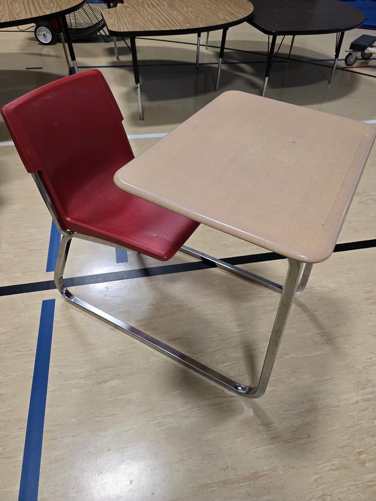 multiple sled desks in red/blue/maroon