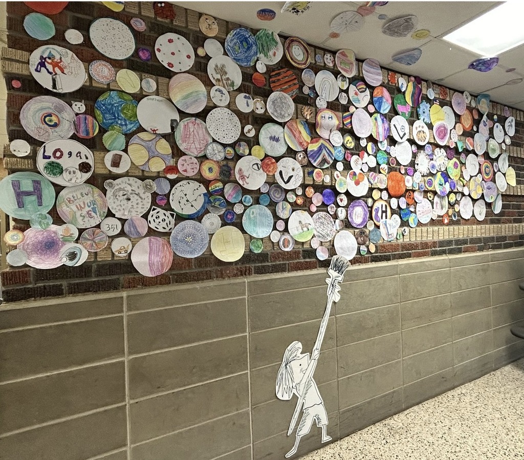 Student made dots on wall