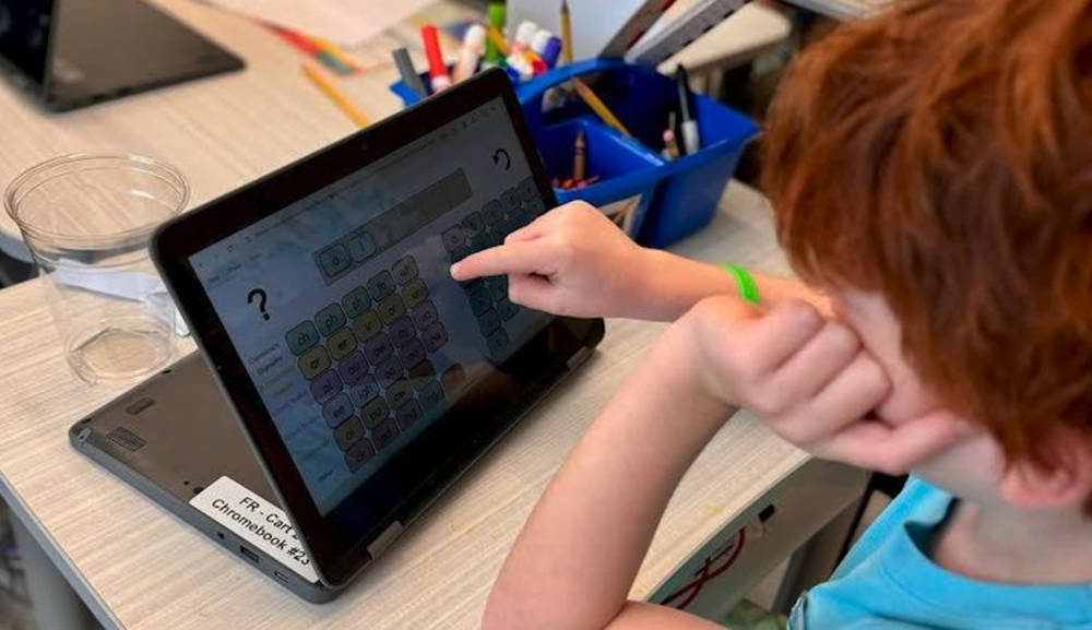 student exploring a chromebook