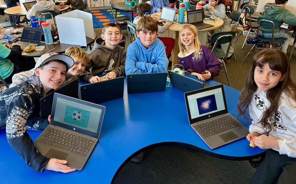 Students sharing their books