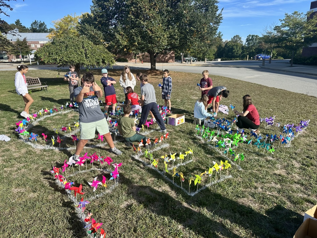students working on their pinwheel display