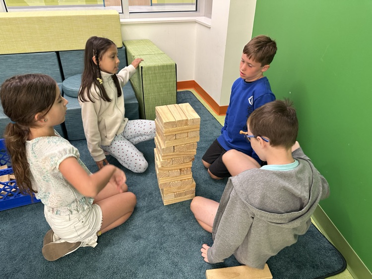students working with blocks