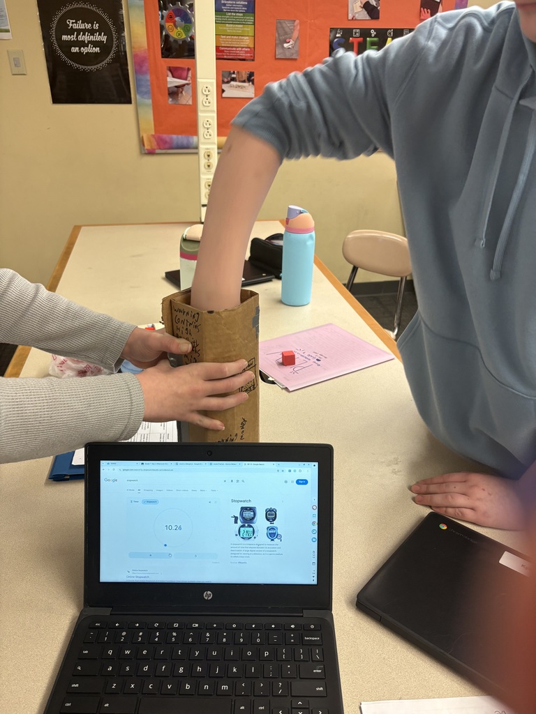 7th grade students testing a therapeutic toy.