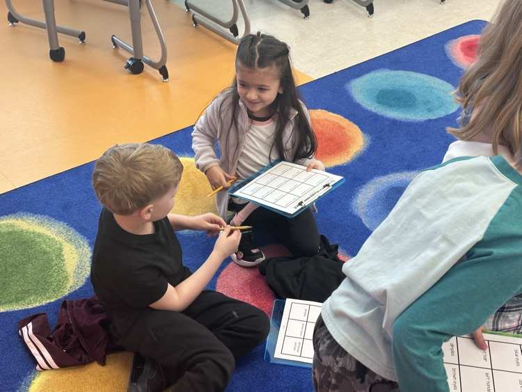 two students asking each other questions