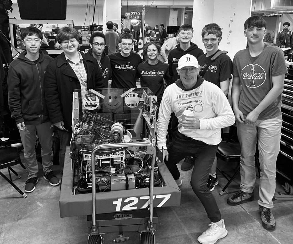 The GD Robotomies took the time to take a picture with a local fan during their post-match media interview at WPI.