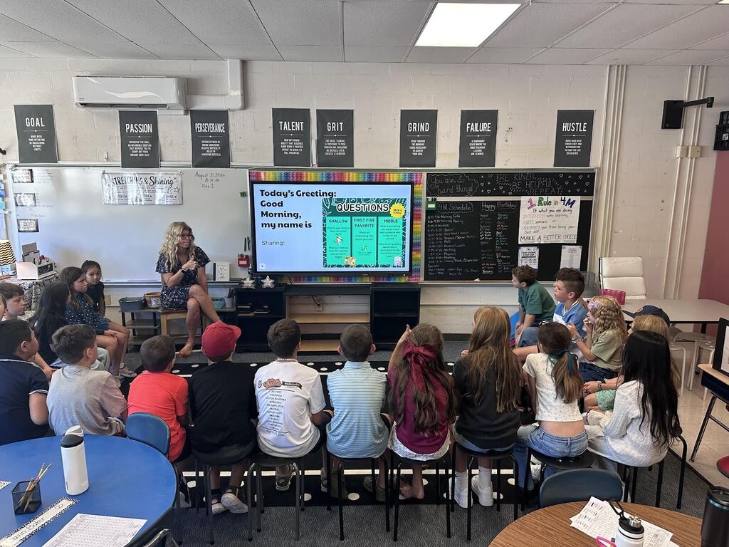 mrs marino works with students.