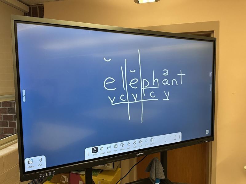 Teacher text on the panel