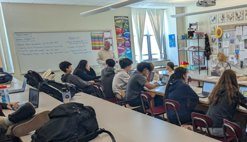 Students work with a GDRHS teacher