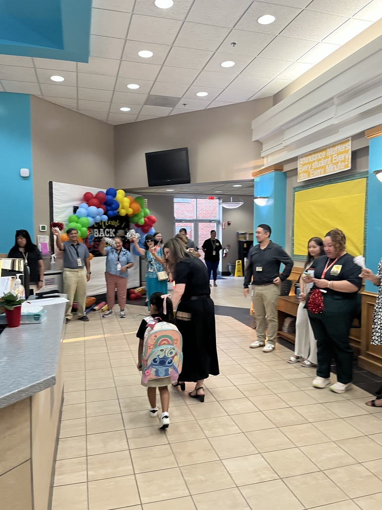 Staff welcoming students