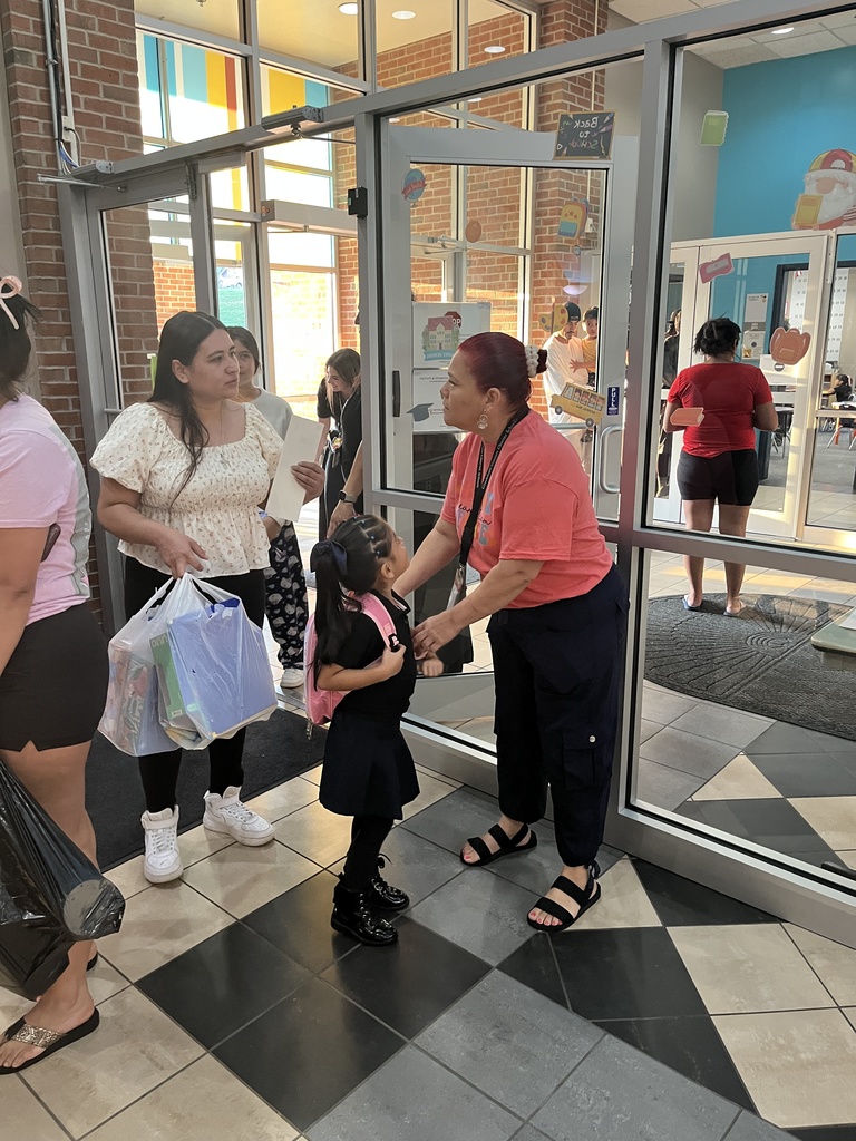 Staff welcoming students