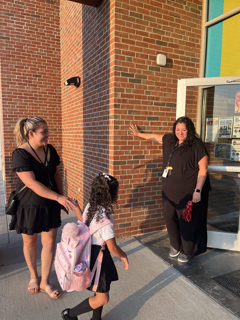 Staff welcoming students