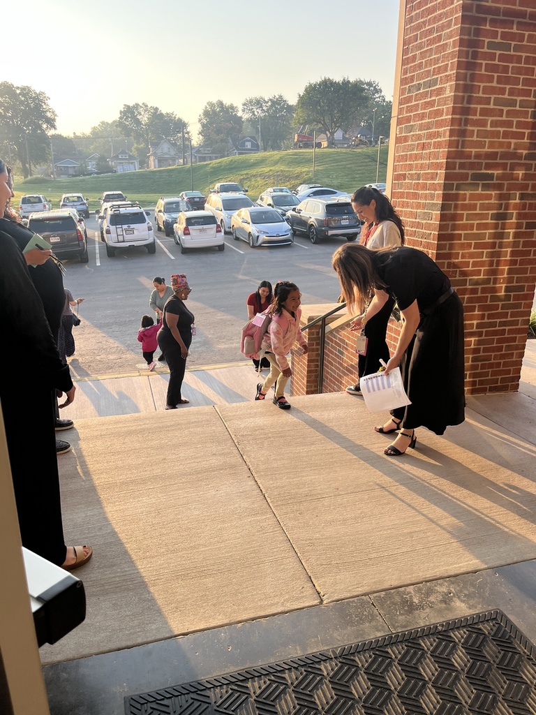 staff welcoming students