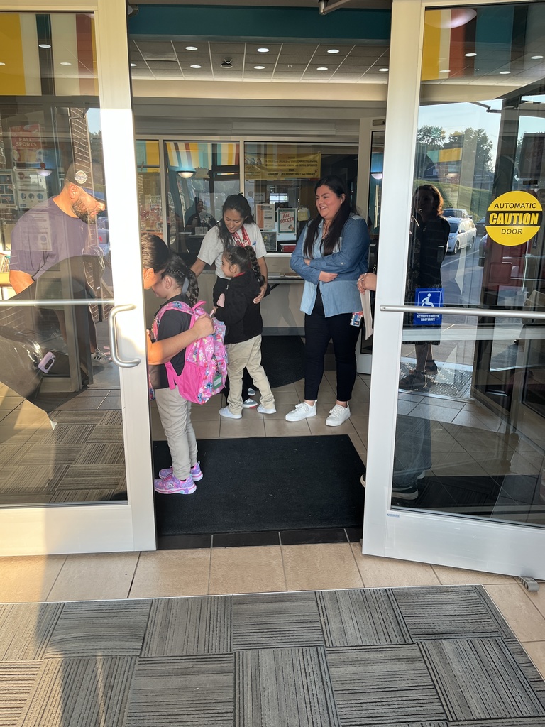 staff welcoming students