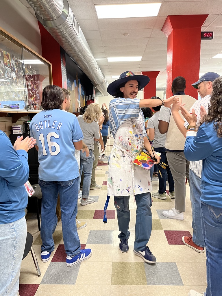 Teachers welcoming students