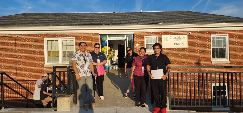 teachers and staff welcoming the little ones
