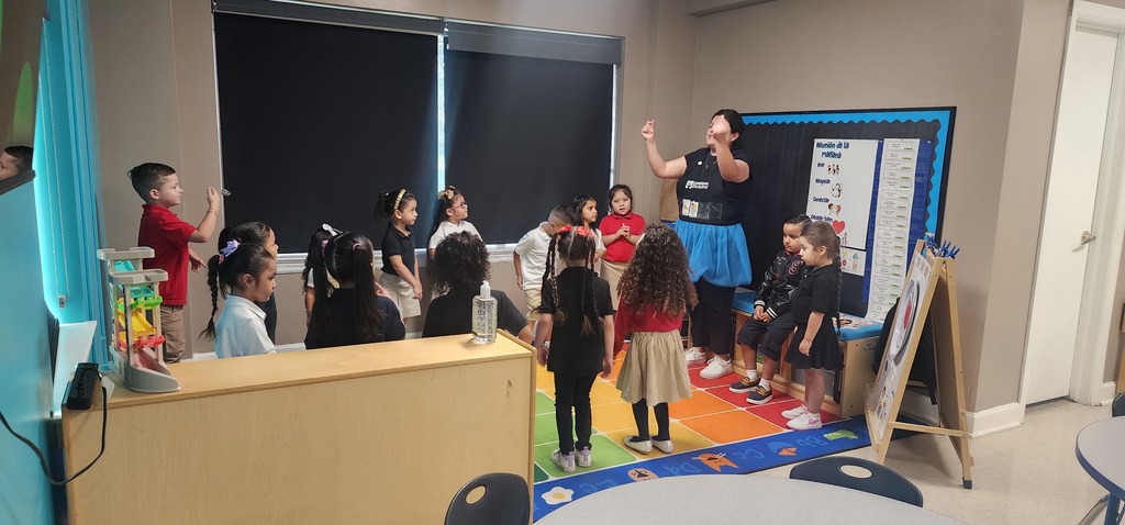 teacher and students on their first day of school