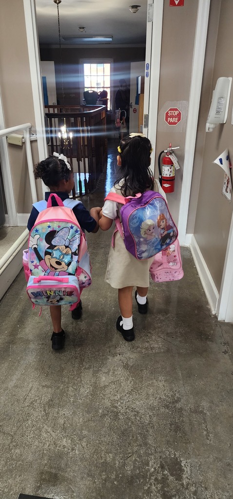 two friends walking together to their classroom