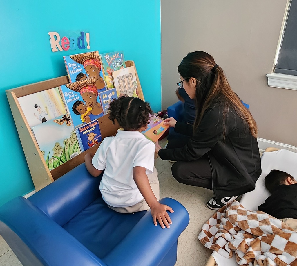 Teacher reading with her students