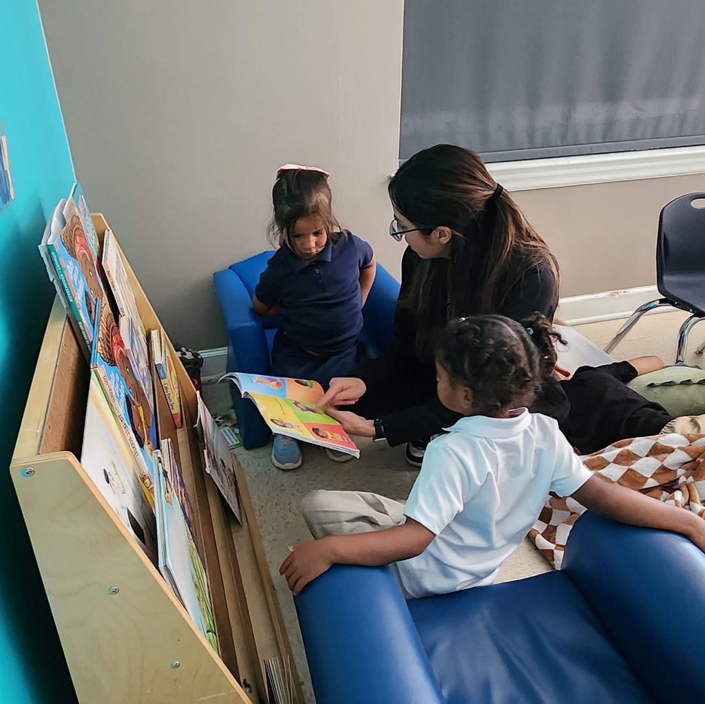 Teacher reading with her students