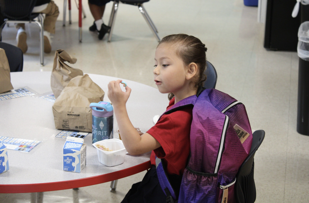 student eating breakfast