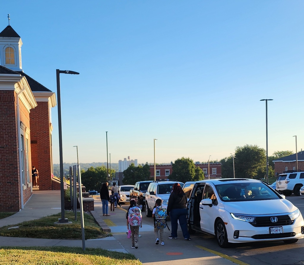 Staff welcoming the children in the morning.