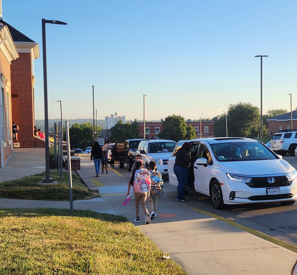 Staff welcoming the children in the morning.