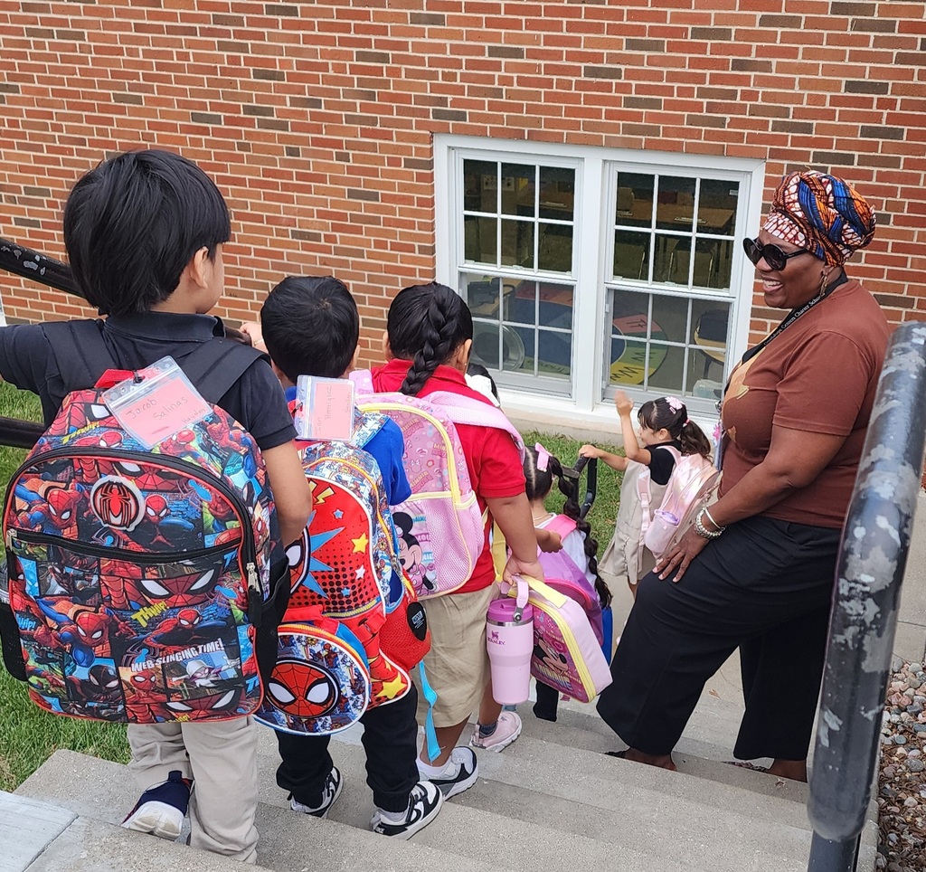 teacher is showing the students how to walk to the classroom