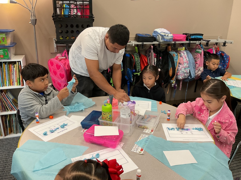 dad doing a craft with kids