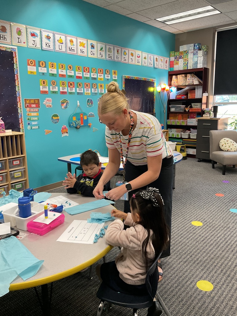 Teacher and children in the classroom 